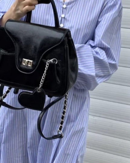 Black stylish handbag with chain