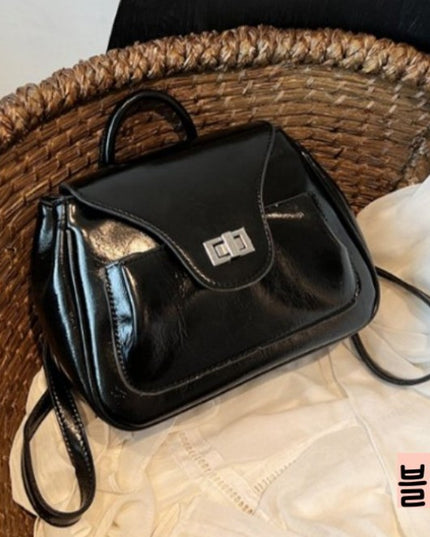 Black stylish handbag with chain